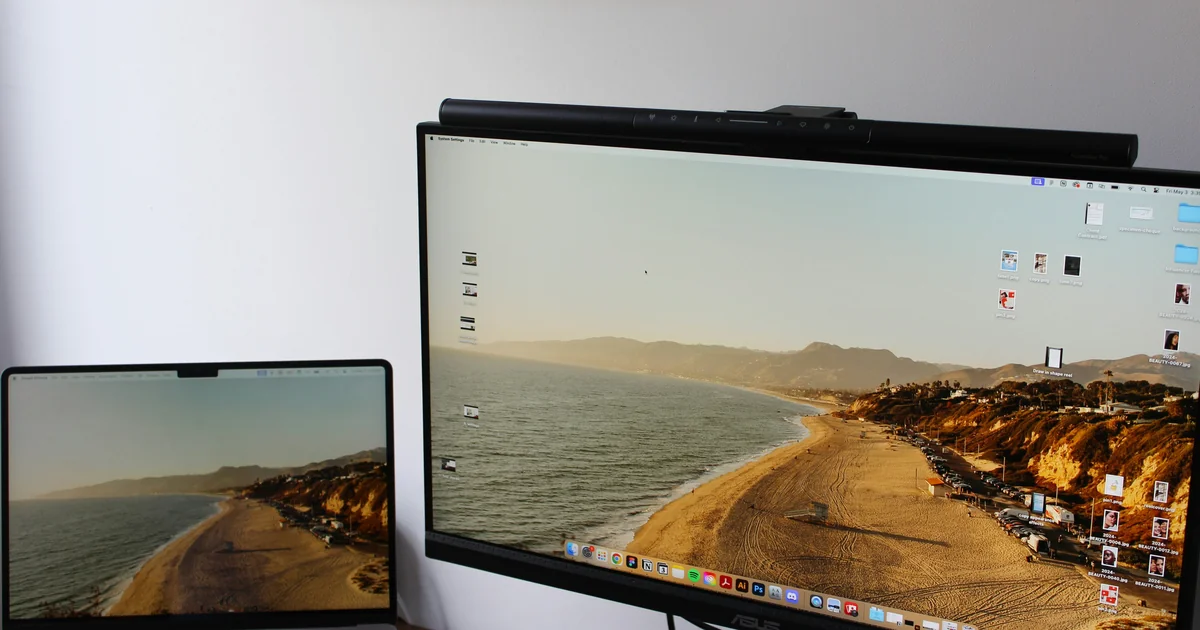 Solo operator workspace with dual monitors, testing AI tools side by side