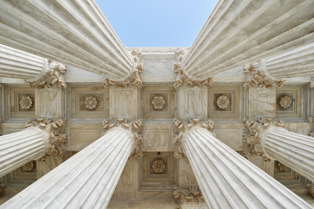 Marble government columns visual for Anthropic global affairs AI News coverage
