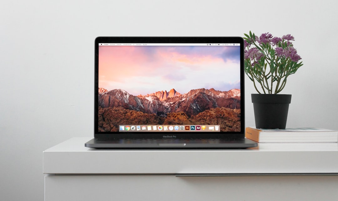MacBook laptop desk visual for Muse Glimmer Productivity coverage