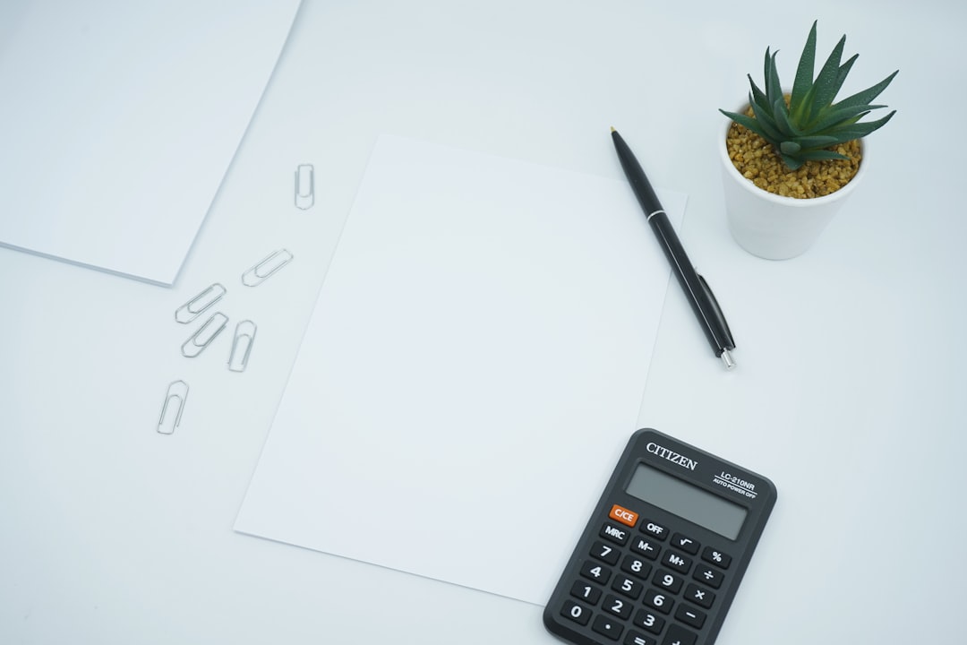 Calculator budget desk visual for DeepSeek V4 Flash AI News coverage