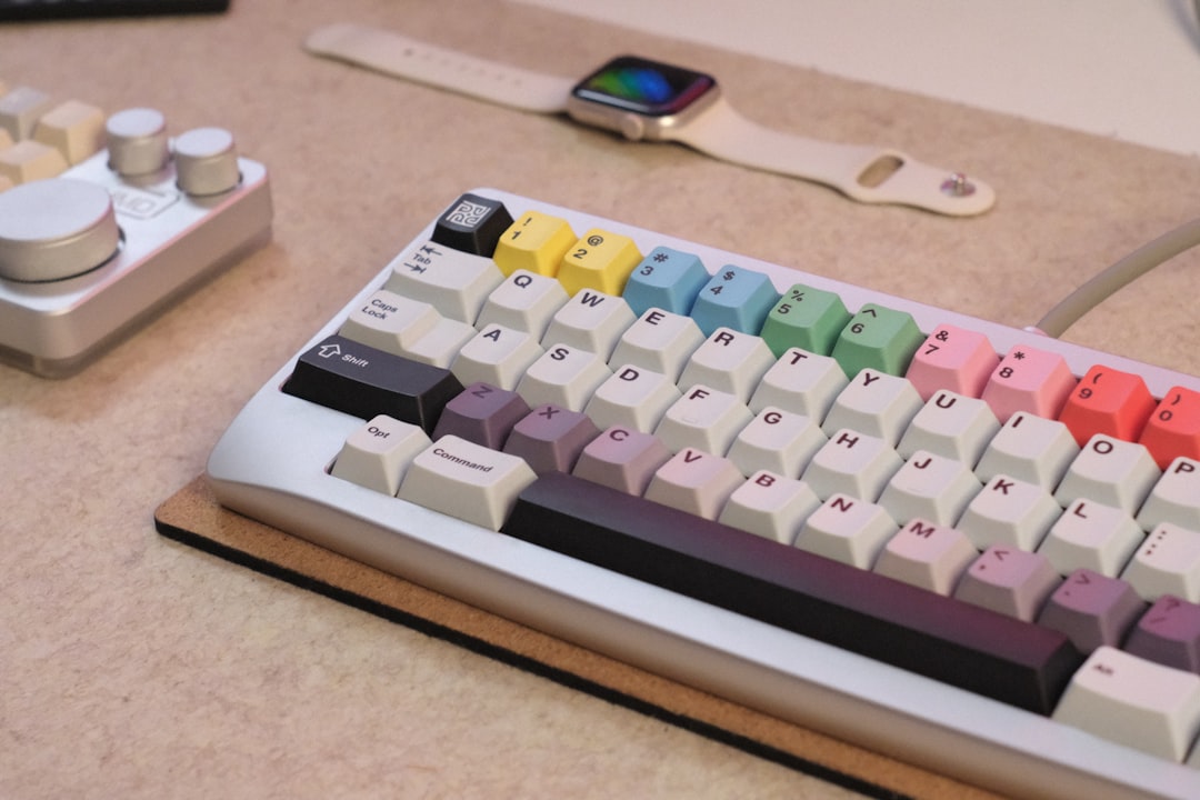 OpenAI Cursor cutoff for coding and building — mechanical keyboard, smartwatch and control knob on a developer desk